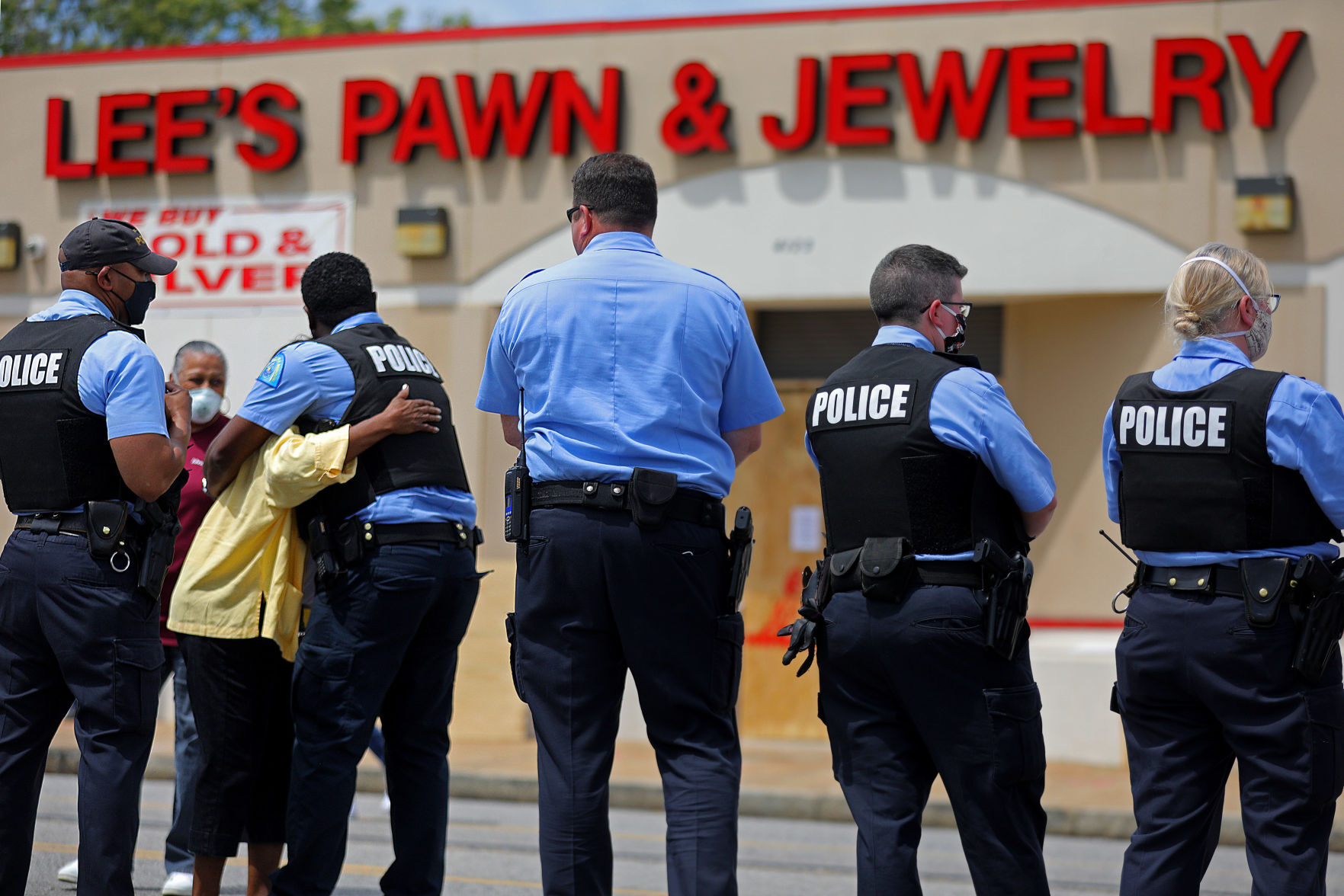 Loved ones remember David Dorn outside Lee's Pawn